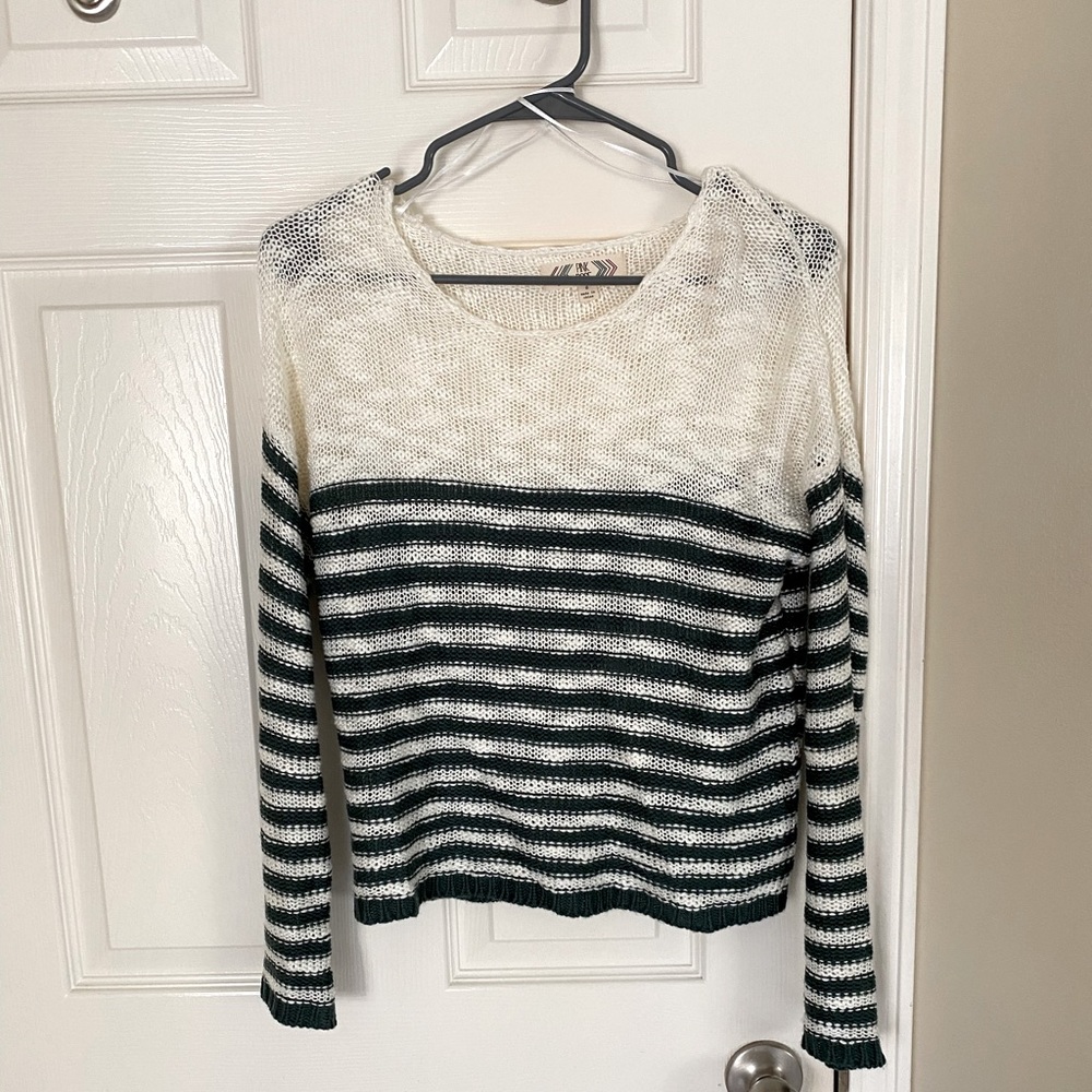 Pink rise sweater. Crop - hits top of hip bones